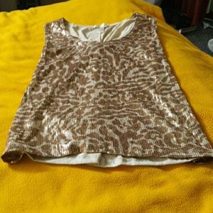 Cheetah print with sequins on it.